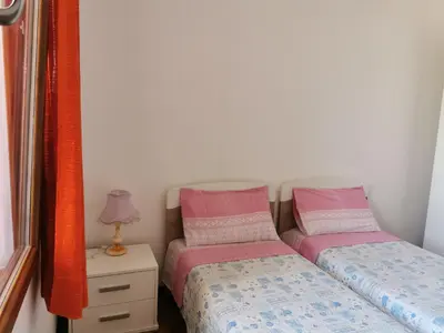 Letto o letti in una camera di b&b Wu Giada