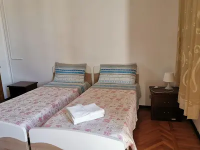 Letto o letti in una camera di b&b Wu Giada