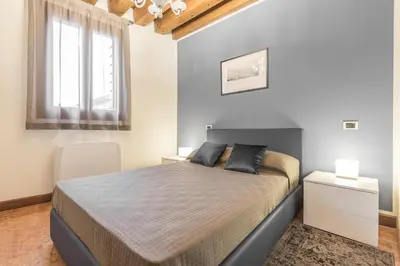 Letto o letti in una camera di Ca' del Monastero 6 Collection Chic Apartment for 4 Guests with Lift