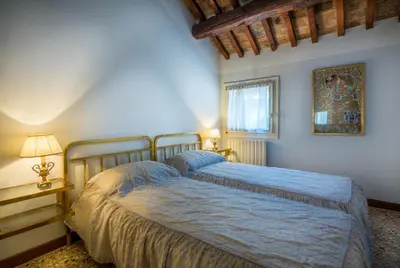 Letto o letti in una camera di Ca Arsenale