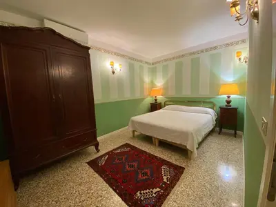 Letto o letti in una camera di Ca Arsenale