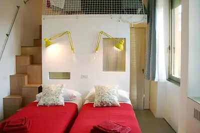 Letto o letti in una camera di B&B Loft Padova