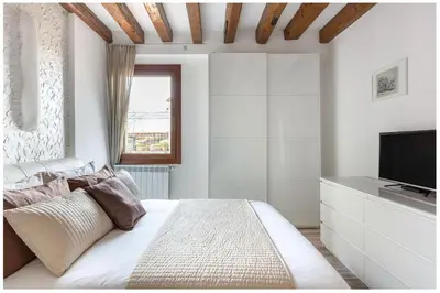 Letto o letti in una camera di Biennale Family Apartment in Venice