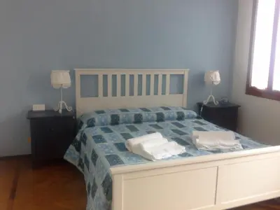 Letto o letti in una camera di Villa Al Sole