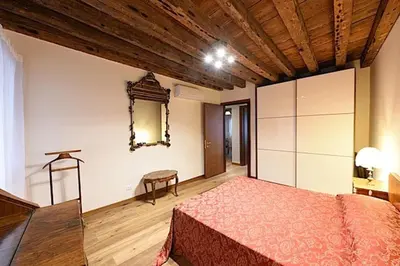 Letto o letti in una camera di Mercerie e Capitello Apartments