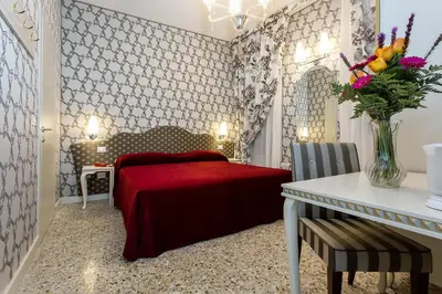 Letto o letti in una camera di Hotel Ca' Nobile Corner