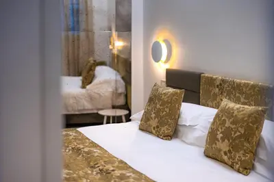Letto o letti in una camera di Palazzo Morosini Degli Spezieri - Lifestyle Apartments