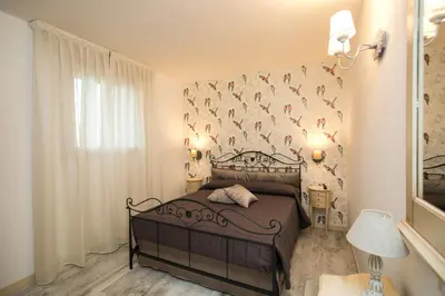Letto o letti in una camera di Guest House Dolce Laguna
