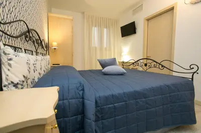 Letto o letti in una camera di Guest House Dolce Laguna