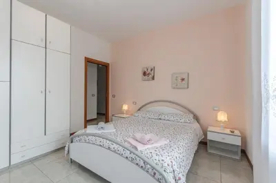 Letto o letti in una camera di Residenza Leon D'oro