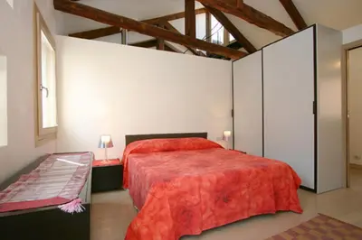 Letto o letti in una camera di Casa Alba