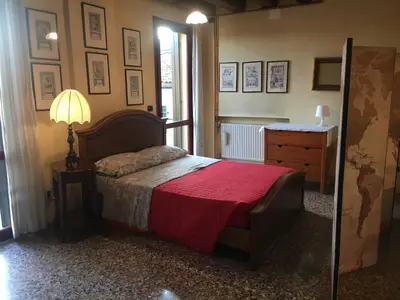 Letto o letti in una camera di Appartamento delle Erbe