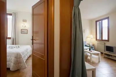 Letto o letti in una camera di Redentore - LOCAPPART