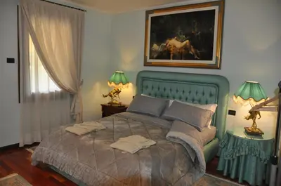 Letto o letti in una camera di Villa Fior di Robinia