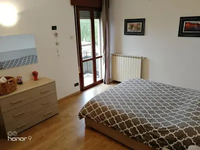 Letto o letti in una camera di Appartamento Ca' Lela