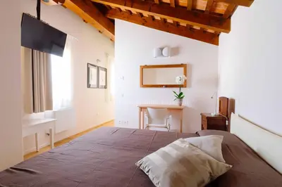 Letto o letti in una camera di B&B Mulino di Campese