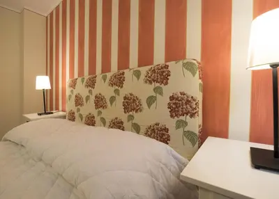 Letto o letti in una camera di Casa delle Ortensie