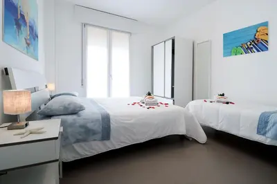Letto o letti in una camera di Appartamenti Gherbin Jesolo
