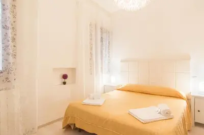 Letto o letti in una camera di Lovely in San Marco