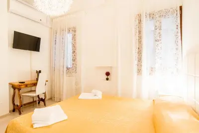 Letto o letti in una camera di Lovely in San Marco
