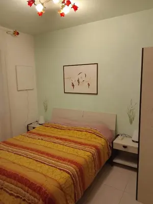 Letto o letti in una camera di Villa Trifoglio