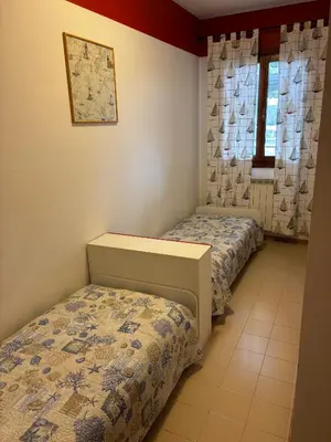 Letto o letti in una camera di Apartaments Marina del Cavallino