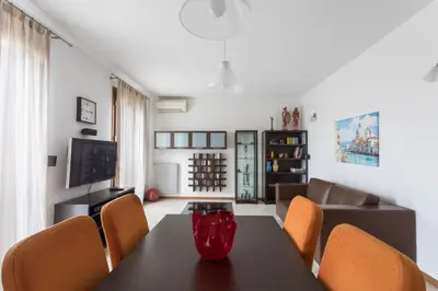 TV o dispositivi per l'intrattenimento presso Sunrise Apartment Venice
