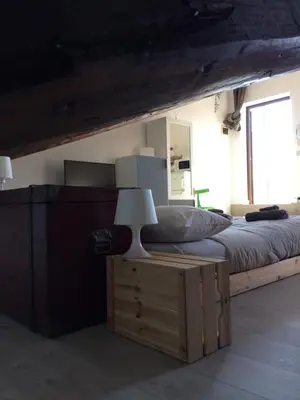 Letto o letti in una camera di La mansardina
