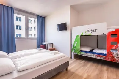 Letto o letti in una camera di a&o Hostel Venezia Mestre
