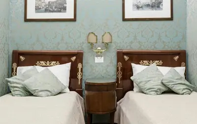 Letto o letti in una camera di Casa Valier