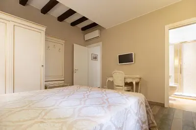Letto o letti in una camera di Doge's House