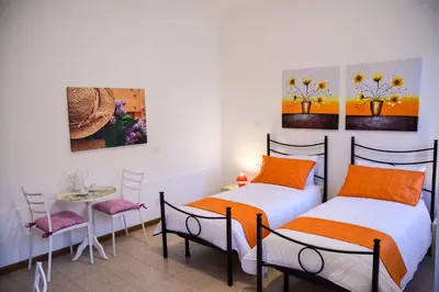 Letto o letti in una camera di Casa Bianca