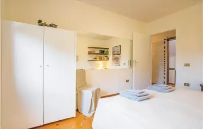 Letto o letti in una camera di Casa Di Mamy