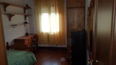 Letto o letti in una camera di B&B Verrazzano affittacamere