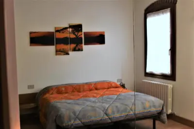 Letto o letti in una camera di Ca' Morandi