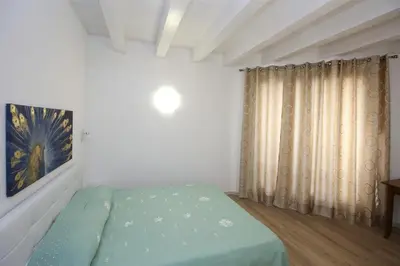 Letto o letti in una camera di Venice Loft