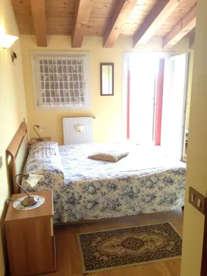 Letto o letti in una camera di B&B Zanin di Zanin Mauro