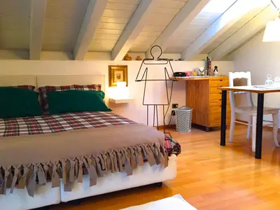 Letto o letti in una camera di La Mansarda di Margherita