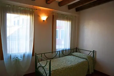 Letto o letti in una camera di Oceano Mare B&B