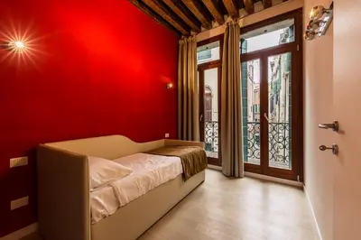 Letto o letti in una camera di Charming Palace Corte del Teatro