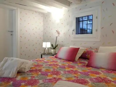 Letto o letti in una camera di Majestic Rialto House by Wonderful Italy