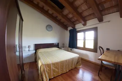 Letto o letti in una camera di Villa Peschiera
