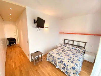 Letto o letti in una camera di Appartamenti Cristina - Carraro Immobiliare - Family Apartments