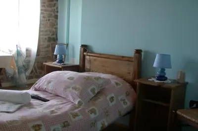 Letto o letti in una camera di b&b alla pergola