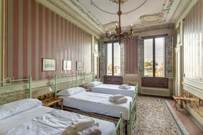 Letto o letti in una camera di Casa Franca