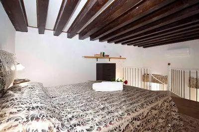 Letto o letti in una camera di DI.GIANFRANCO PIANO NOBILE