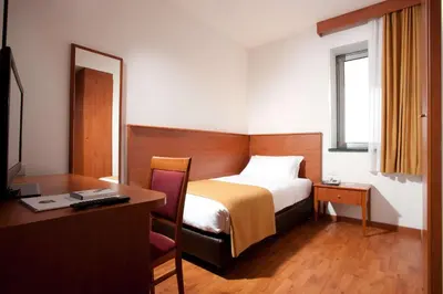 Letto o letti in una camera di Best Western Park Hotel Continental