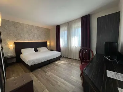 Letto o letti in una camera di Best Western Park Hotel Continental