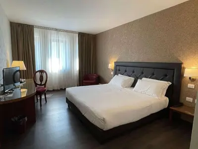 Letto o letti in una camera di Best Western Park Hotel Continental