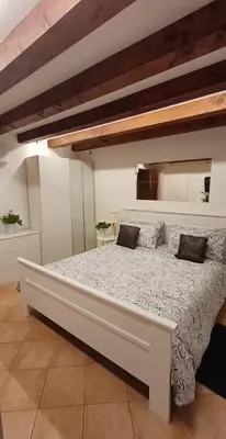 Letto o letti in una camera di Fiore della Laguna